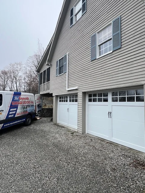 Garage door spring and opener repair across Putnam County NY by Bill Reynolds Jr.