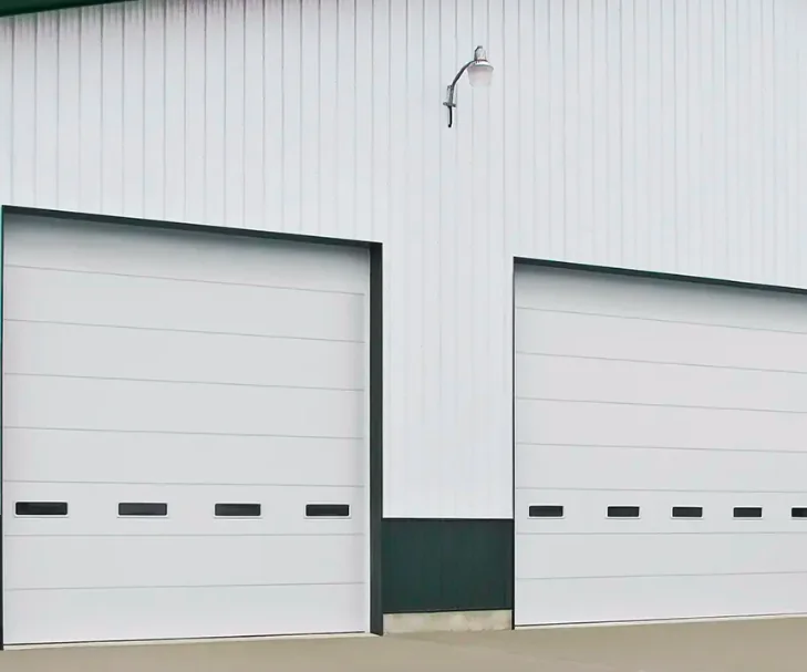 Polystyrene insulated commercial sectional garage door — Reynolds NY install